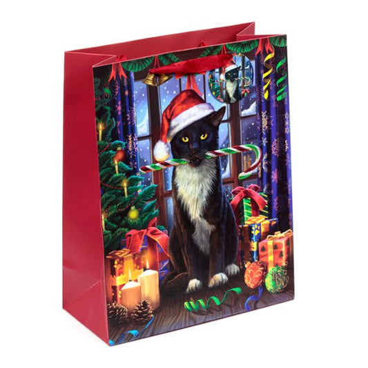 Gift bag with a black cat wearing a Santa hat and candy cane, surrounded by Christmas decorations.