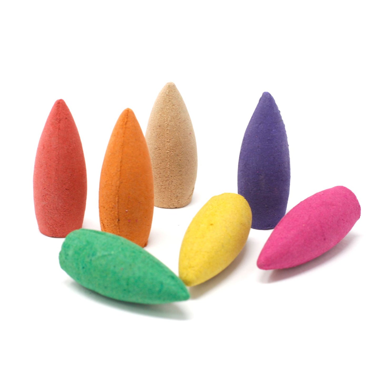 Set of colorful incense cones on a white background